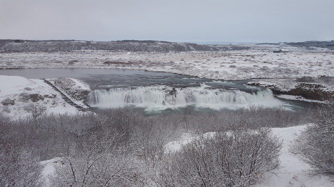 Kirkjufellsfoss waterfall near Mount Kirkjufell – Iceland adventure tours