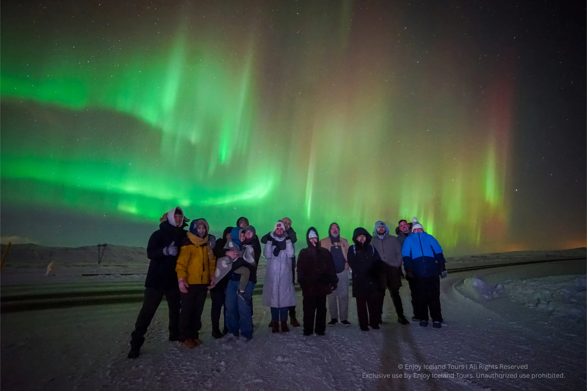 Small group enjoying a private Northern Lights tour in Iceland